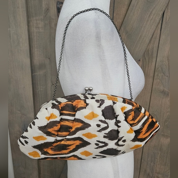 K.C.MALHAN Ikat Printed Woven Cloth Dumpling Chain Bag In Orange/brown Multi. - Picture 6 of 11